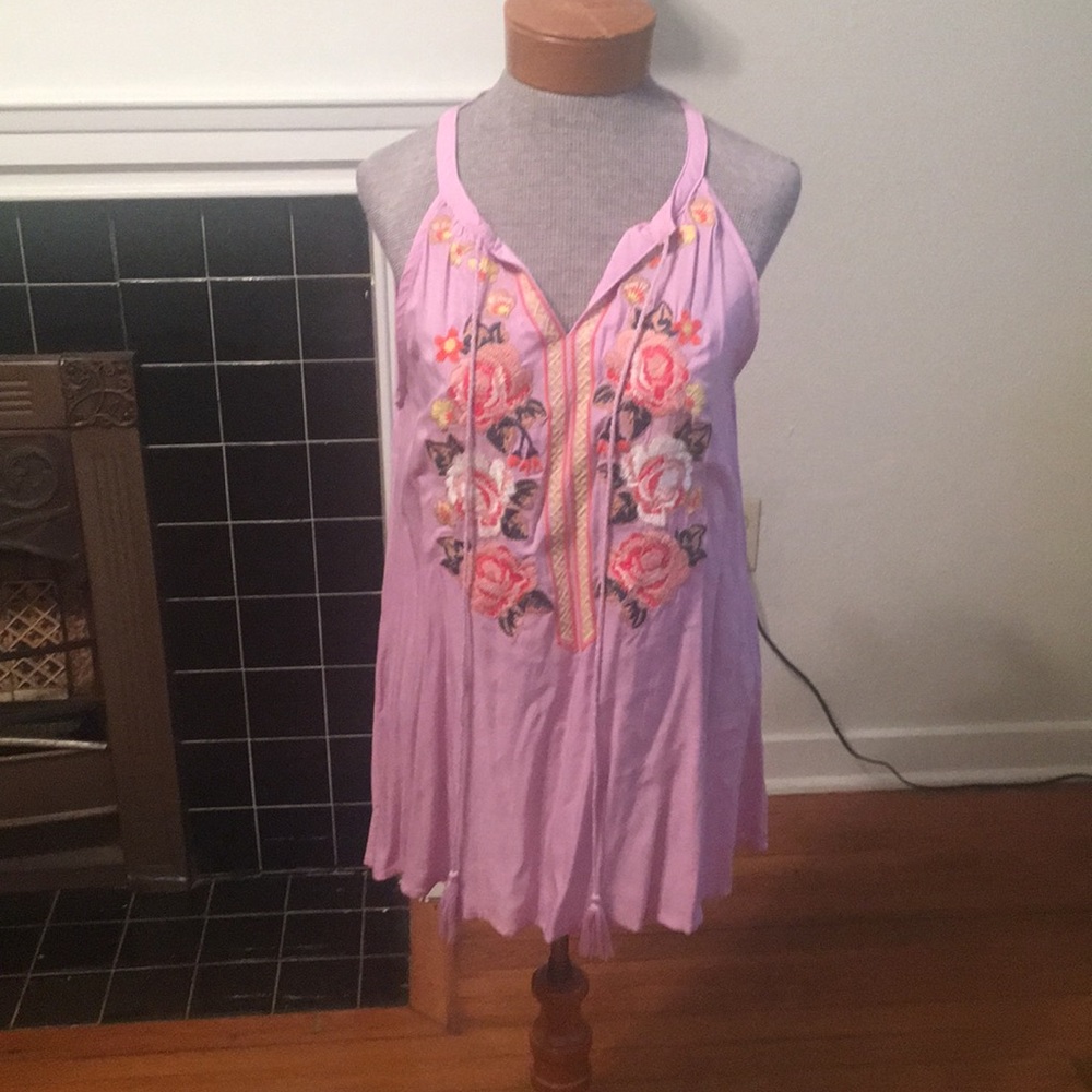 Purple and floral sleeveless shirt